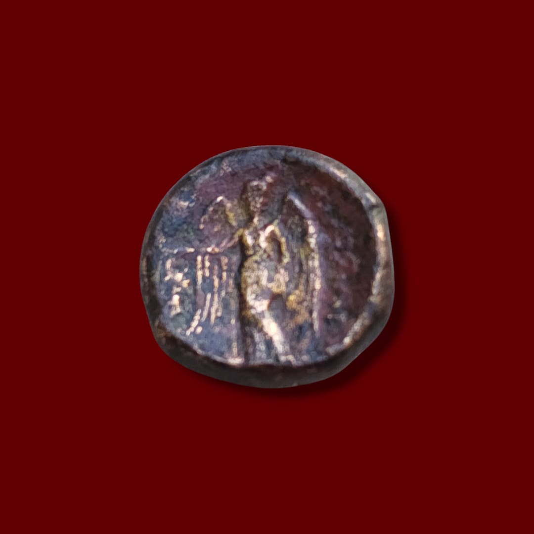 Seleukos I Nikator — Reverse Ancient coin showing Nike standing beside an elephant, holding a wreath, on the reverse of a Seleukos I bronze.