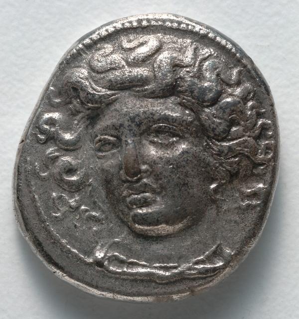 Larissa Silver Drachm: Facing Head of the Nymph and Thessalian Equine Iconography, obverse
