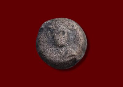 Obverse showing a faint bust of Antiochus VII Sidetes, wearing diadem, facing right on an ancient bronze coin.