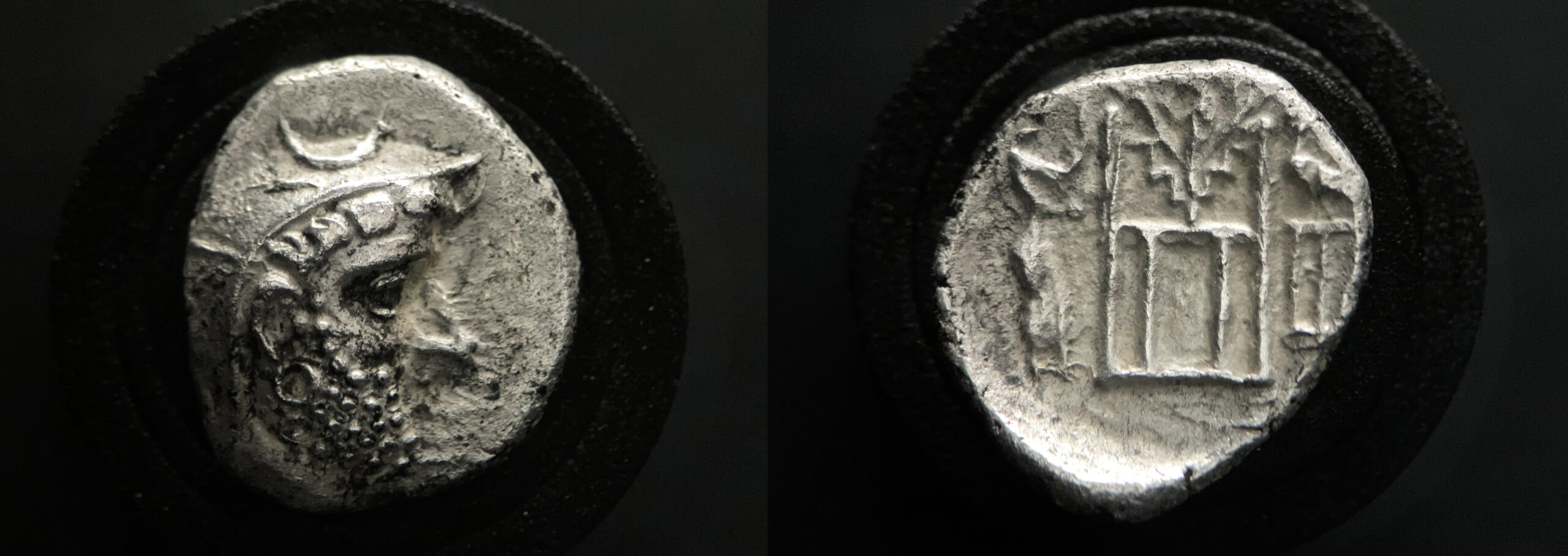 Silver drachm of Darios I of Persis showing bust and fire temple