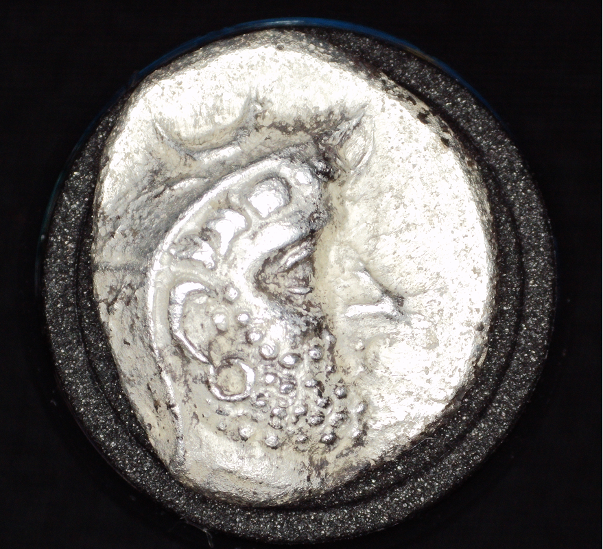 Obverse of silver drachm featuring bust of Dārēv I of Persis, facing right, wearing kyrbasia with diadem and dotted beard