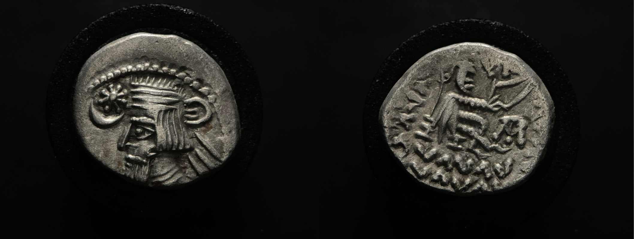 Parthian drachm of Artabanos IV featuring crowned bust and archer with Greek inscription