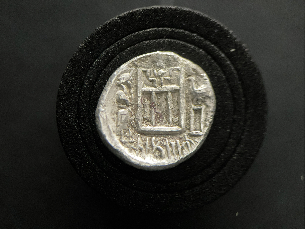 Zoroastrian fire altar with king, eagle standard, and Ahura Mazda